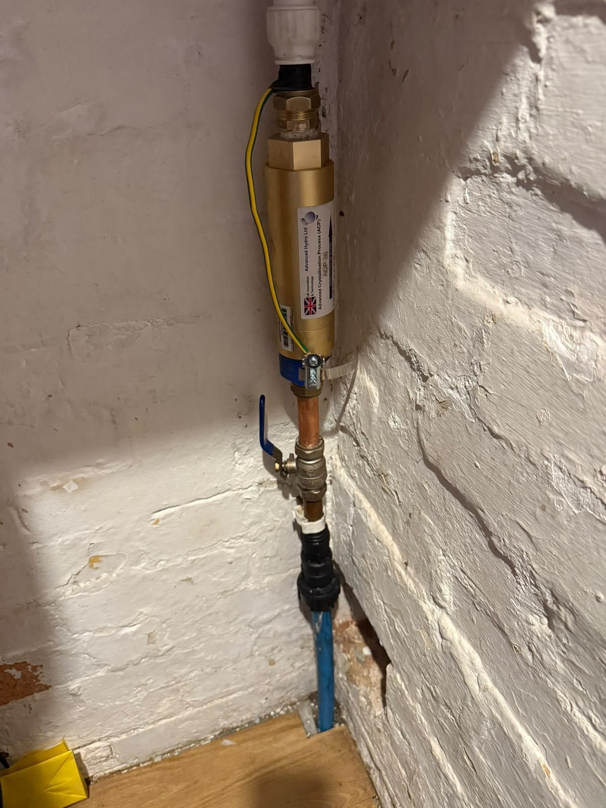 Inline water scale reducer fitted onto copper mains pipework to protect the hot water system